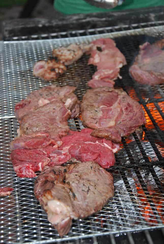 Grass fed beef being cooked at a Genesis Gym BBQ. Red meat is an excellent source of protein when it is grass fed. And when it is not over-cooked.